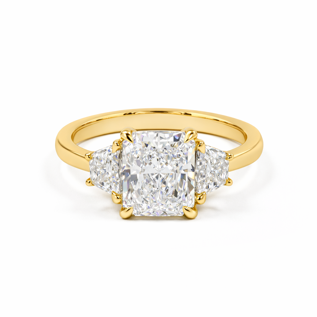 sterling | 3.86 ct radiant diamond three-stone ring | 3.86 in yellow gold
